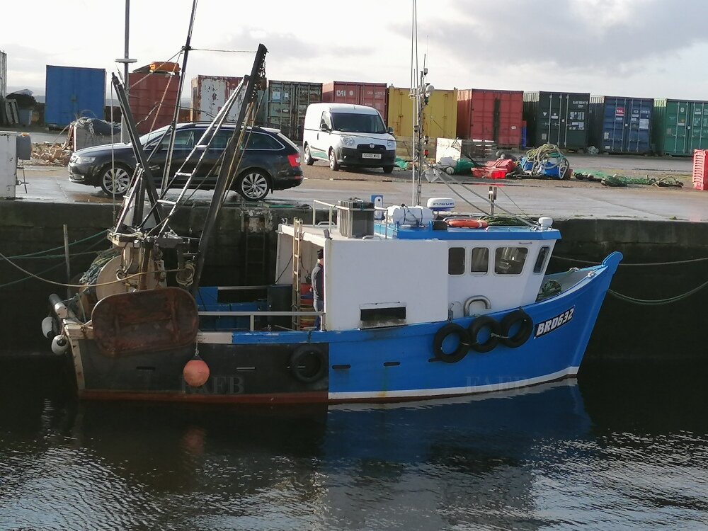 Wooden Dennis Swire Design